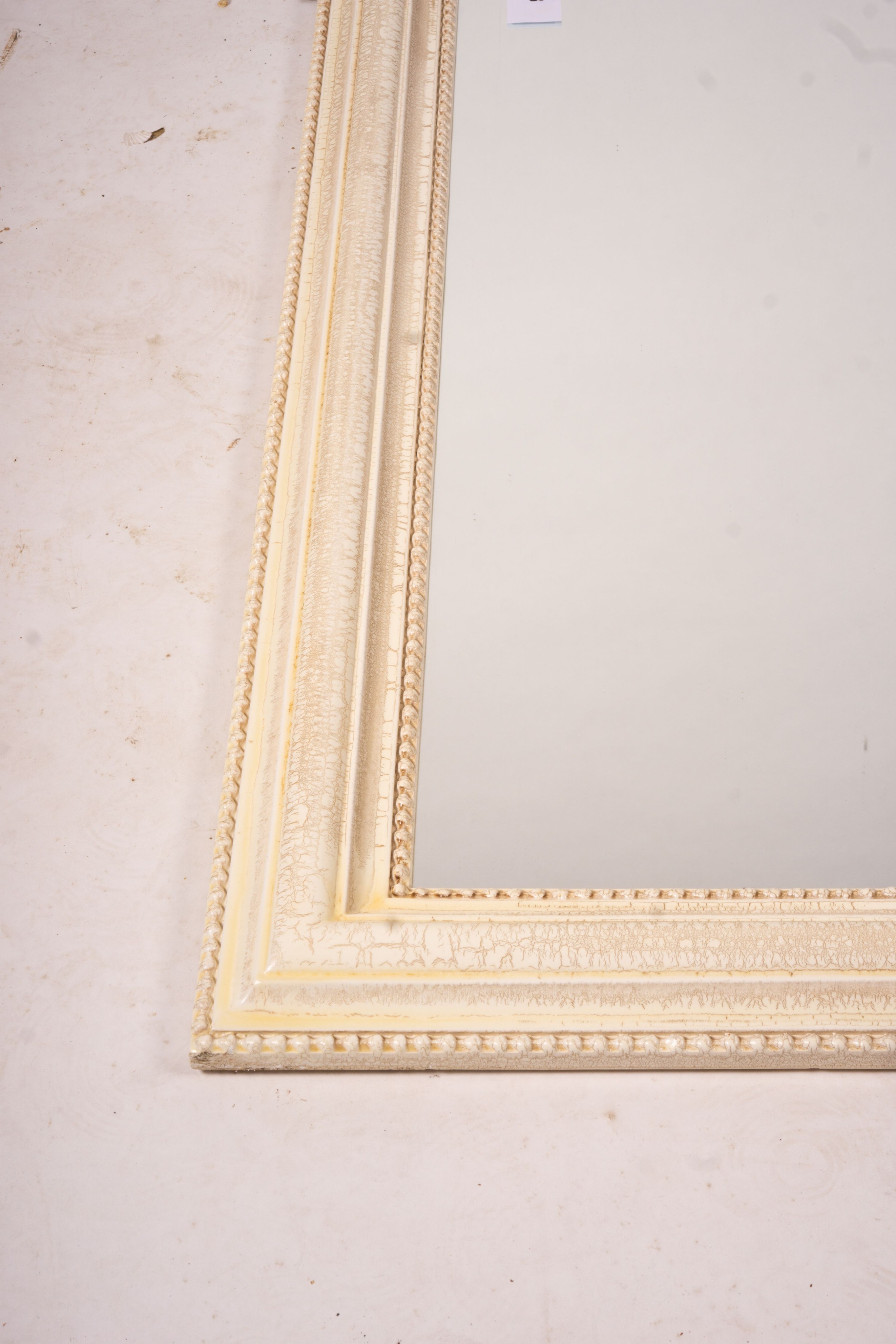 A Laura Ashley overmantel mirror, W.86cm H.110cm